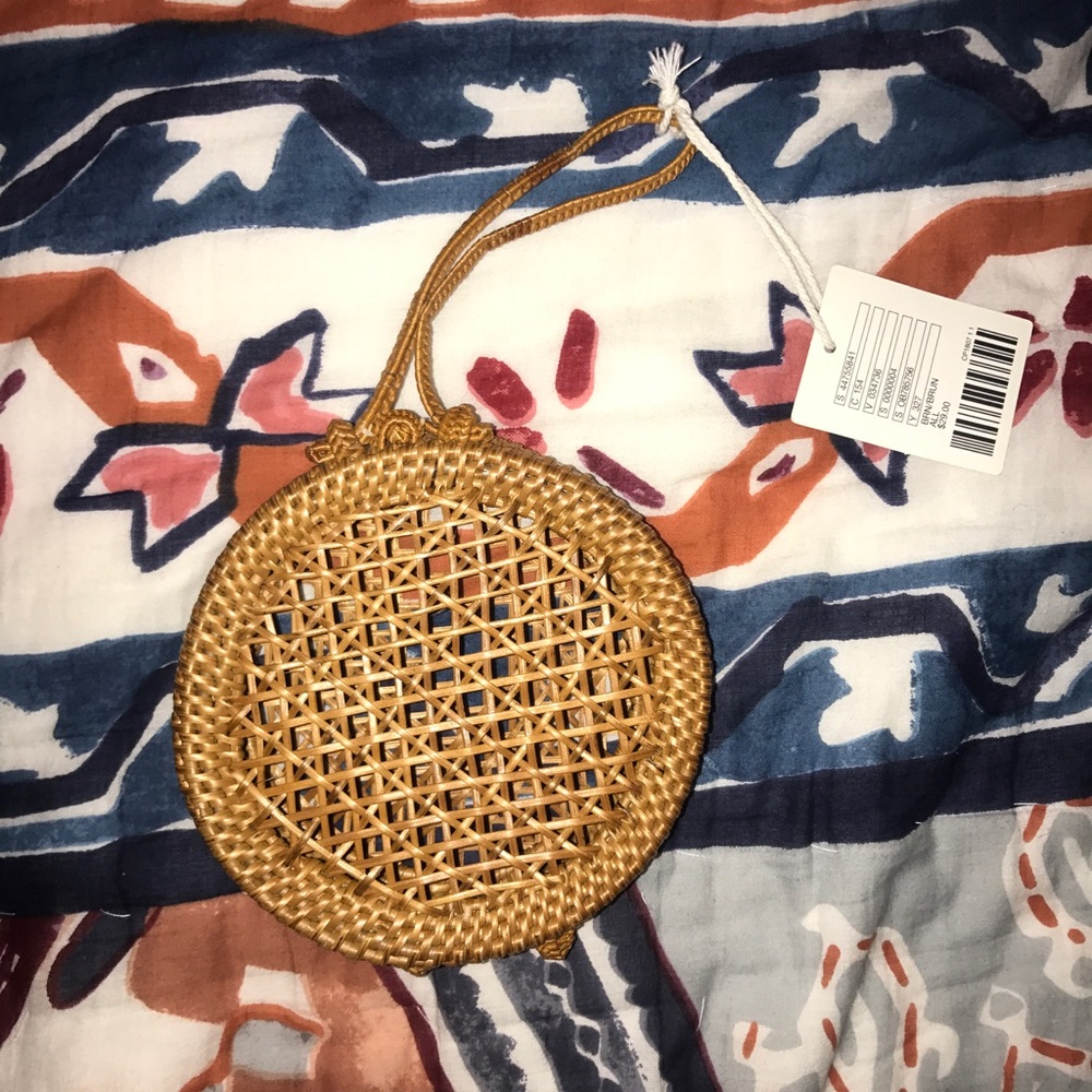 Small straw clutch. NWT